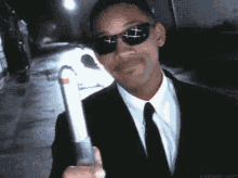 men-in-black-flashy-thingy.gif