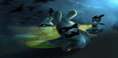 This one show three Rabbids on skateboards (with one with the old RRR logo) in what look like a forest. We can see a city in the backgrounds.