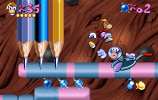 Des crayons fixes bloquant le passage de Rayman.