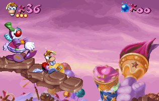 Rayman étourdi par un clown frappeur.