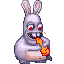 Le Lapin en train de manger une carotte.