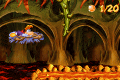 Rayman sur un nénuphar approchant d'une ronce géante dans Lave en fusion.