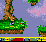 Rayman à côté d'un groupe de champignons dans la Clairière de la Fée