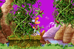 Rayman accroché à des lianes.