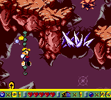 Rayman grimpant sur une liane dans Rocky Peaks.
