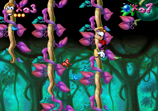 Rayman suspendu à des liane dans la version Jaguar de sa première aventure