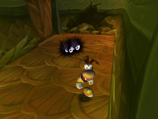 Des petites chenilles attaquant Rayman dans le Sanctuaire de Terre et de Lave.
