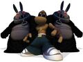 Rayman portant le costume Yo encadré par des Lapins Timidants.