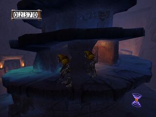 Rayman doit se cacher derrière ce pilier pour éviter ces Knaarens.