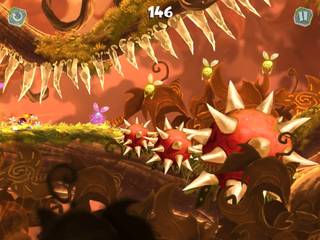 Rayman surfant vers des fleurs piquantes.