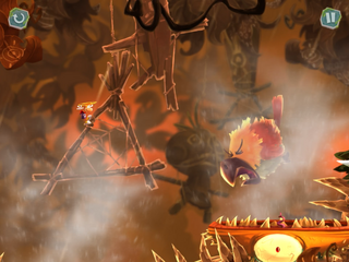Rayman évitant la charge d'un oiseau multicolore. On peut voir une poupée vaudoue et un chapeau de Mr Dark en bois dans le décor.