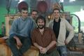 De gauche à droite : Jacques Exertier, Michel Ancel, Peter Jackson et Xavier Poix. Photo prise dans un décor du film King Kong.