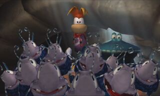 Les Ugly, Rayman et Globox en train d'observer Bégoniax et Razoff.