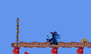 L'amulette anti-sort dans le premier jeu Rayman, rendue visible par un hack. Son sprite est identique à celui utilisé pour les points de sauvegarde sur la carte du monde.