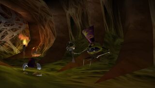 Rayman face à Jano devant l'entrée de la Grotte des Mauvais Rêves.
