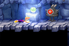 A robot in front of Rayman.