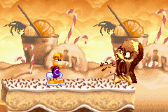 A vampire cake about to spit a chocolate chip at Rayman.