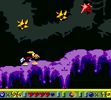 Yellow prickly balls next to a red prickly fruit in Dark Legacy