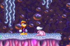 A pink rabbid ducking to dodge Rayman's fist.