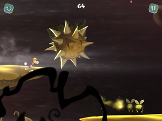 A spiky flower falling in Rayman's path