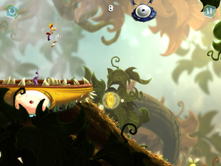 Rayman jumping over a wind monster