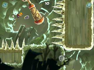 Rayman hitting a switch