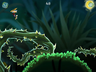 Rayman flying over a Darkroot and towards a Skull Coin