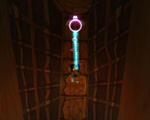 Rayman swinging on a purple Lum in Rayman 2