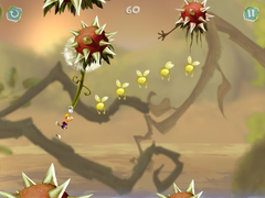 Rayman gliding on a dandelion to reach a spiky flower with an arm.