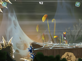 Rayman bouncing towards a gust of wind