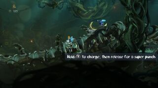 Rayman charging a punch targeted at the fourth Dark Teensy.