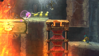 Rayman collecting Lums.