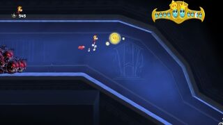 Rayman jumping towards a Skull Coin.