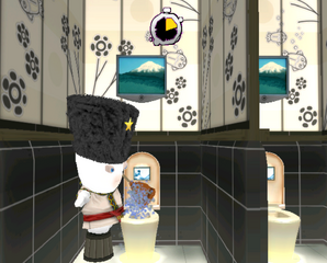 A Rabbid unclogging a toilet in Rayman Raving Rabbids 2