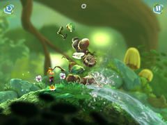 Rayman destroying a barrier.