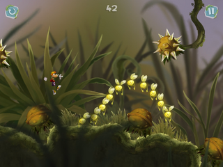 Rayman jumping through open and closed spiky flowers