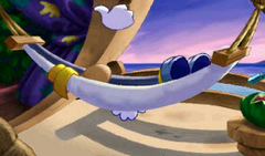 Rayman relaxing on an island.