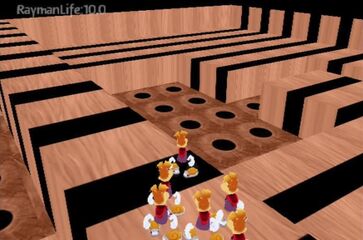 A screenshot of the development build depicting multiple Rayman models standing in a simple environment with varying wooden textures.