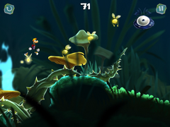 Rayman jumping on mushroom platforms and towards a Psychlops.