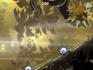 Rayman flying backwards and over two Psychlops