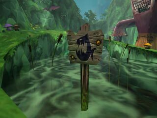 Piranha-infested bodies of water are indicated by warning signs in Rayman 2.