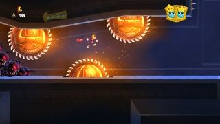 Rayman leaping through buzzsaws.